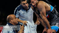 حضور همزمان احسان امینی در کشتی آزاد جوانان و بزرگسالان