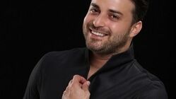 عکس | بازی بابک جهانبخش با دم شیر!